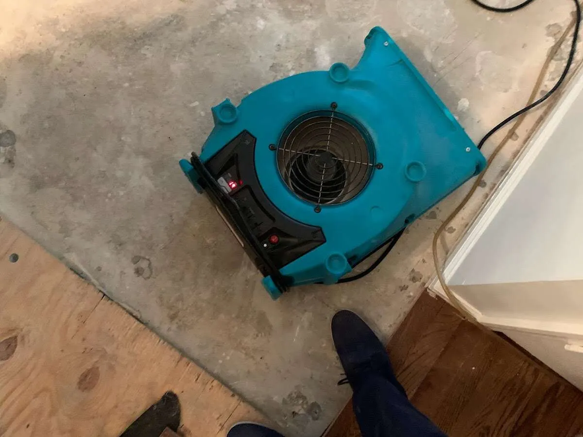Air mover drying subfloor during Leak Detection & Repair in Statesville